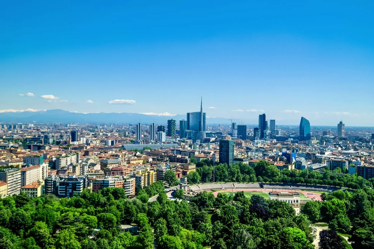 Milan skyline with the Porta Nuova district and the Alps on a clear day